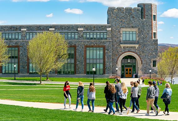 An image of students walking on a campus tour. 